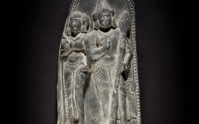 A black stone stele depicting royalty, East India, Pala period, 11th / 12th century