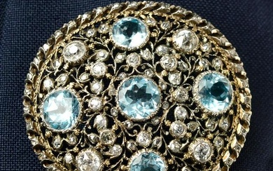 A blue topaz, old and rose-cut diamond brooch, in the manner of Buccellati.One topaz calculated