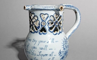 A delftware puzzle jug c.1740-60, probably Liverpool, the...