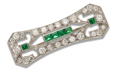 A diamond and emerald panel brooch, the pierced rectangular panel set with brilliant and single cut diamonds with calibre emerald detail, 1920s, length 3.6cm.