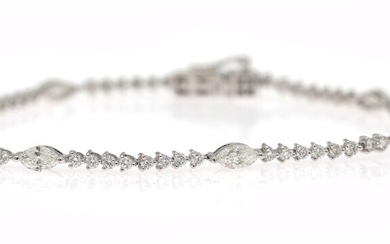 NOT SOLD. A diamond bracelet set with numerous marquise and brilliant-cut diamonds weighing a total...