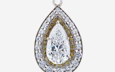 A diamond, colored diamond, and ten karat white gold pendant