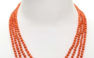 A four row graduated carved coral bead necklace