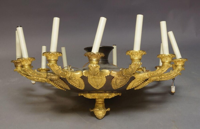 WITHDRAWN A gilt-bronze Restauration style ten-light chandelier, 20th century, the circlet with pierced foliate and anthemion mounts, 120cm high approx