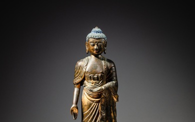 A gilt-bronze and repoussé figure of Amitabha Buddha, Qing dynasty, Qianlong period | 清乾隆 鎏金銅阿彌陀佛立像