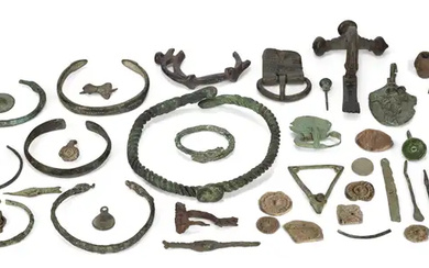 A group of ancient to medieval bronze items, Including the escutcheon of...