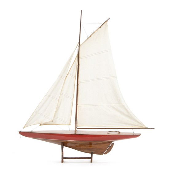 A hand built 20th century painted wood model of a sailing ship. With wooden stand. 20th century. H. excl. stand c. 105 cm. L. 92 cm.