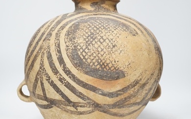 A large Chinese black painted pottery jar, Neolithic, Machan...