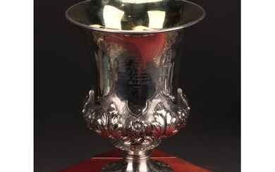 A large George IV silver campana goblet, chased with flowers...
