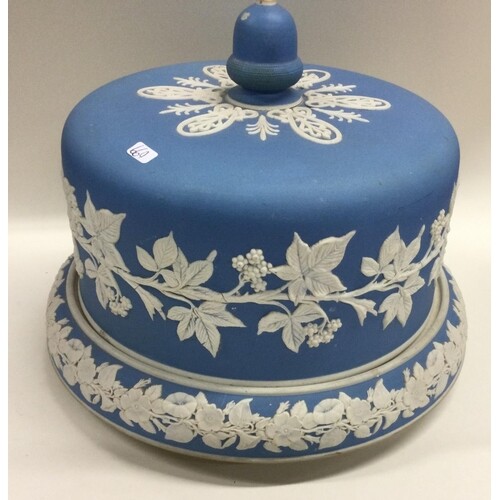 A large Wedgwood Jasperware blue and white cheese dome and c...