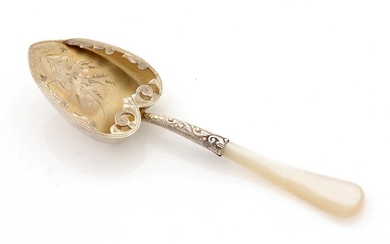 A late Victorian parcel-gilt caddy spoon.