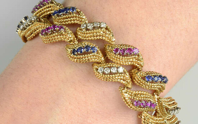 A mid 20th century gold sapphire, ruby and brilliant-cut diamond bracelet, with matching ring and earrings.