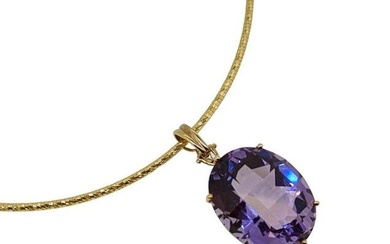 A modern amethyst pendant and chain, claw set oval shaped chequerboard faceted amethyst