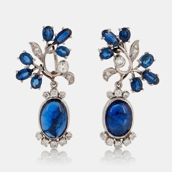 A pair of CF Carlman platinum earrings set with cabochon-cut and faceted sapphires