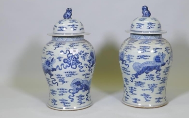 A pair of Chinese blue and white jars and...