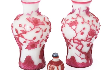 A pair of Chinese pink overlay white Peking glass 'Bird and Prunus Tree' vases