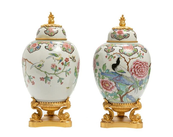 A pair of Chinoserie lidded porcelain vases/ginger jars
