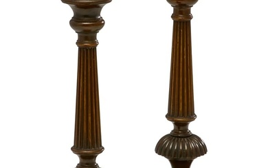 A pair of George III style mahogany candlesticks