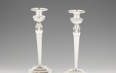 A pair of German silver candlesticks 'Retour d'Egypte'