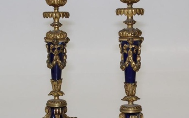 A pair of Louis XVI style gilt bronze and blue...