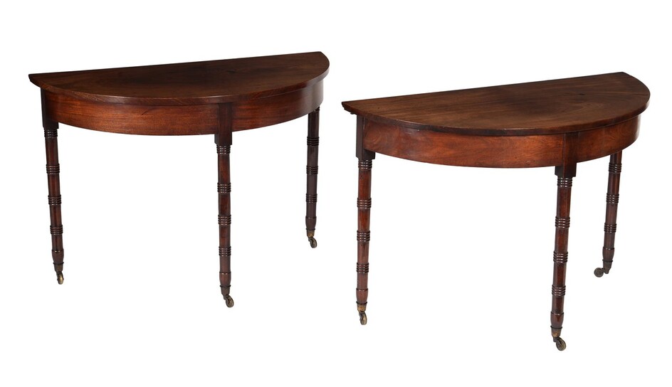 A pair of Regency mahogany demi lune side tables