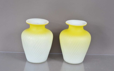 A pair of Victorian canary yellow and white satin glass "Pompeian Swirl" air trap vases