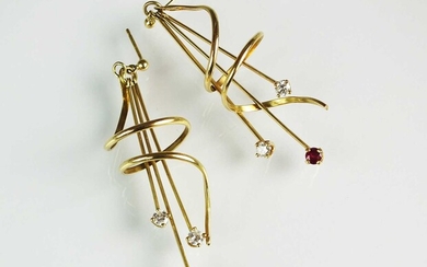 A pair of diamond and ruby earrings