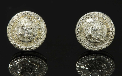 A pair of diamond set cluster stud earrings