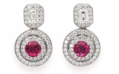 SOLD. A pair of ear pendants each set with a ruby encircled by numerous diamonds weighing a total of app. 1.26 ct., mounted in 18k white gold. (2) – Bruun Rasmussen Auctioneers of Fine Art
