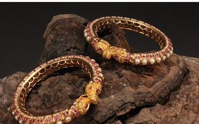 A pair of high carat gold coloured metal Indian wedding bang...
