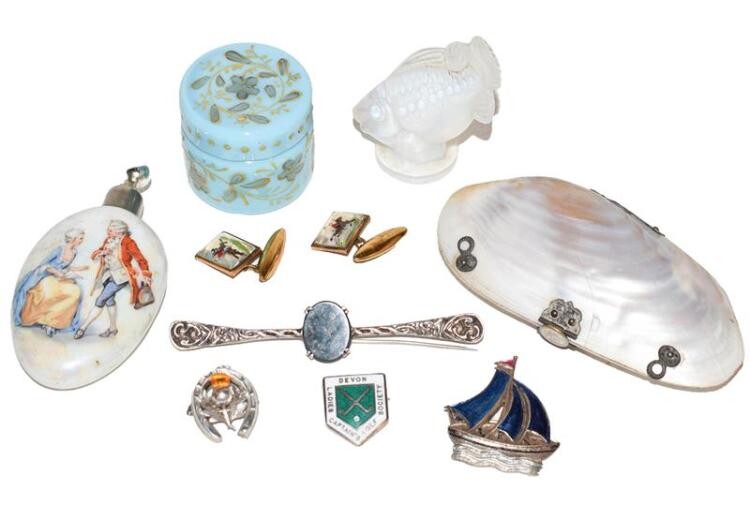 A pair of hunting cufflinks, a scent bottle, shell purse,...