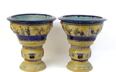 A pair of large Chinese pedestal planters / jardinieres on s...
