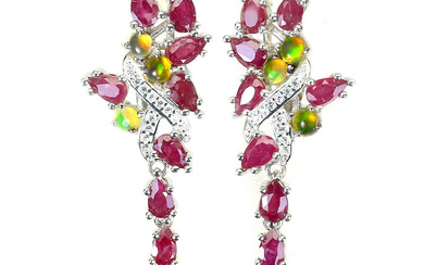 A pair of rhodium-plated sterling silver ruby ??studs (2)