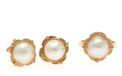 A pearl jewellery collection comprising a ring and a pair of ear studs each set with a mabé pearl encircled by four single-cut diamonds, mounted in 14k gold.(3)