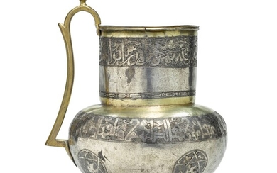 A rare and important Seljuq silver-gilt and nielloed handled jug, Siberia or Central Asia, 11th/12th century