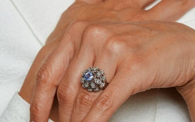 A sapphire, diamond and platinum ring, circa 1950.