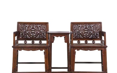 A set of hardwood carved rose chairs