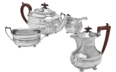 A silver four piece oblong baluster tea set by Adie Bros.