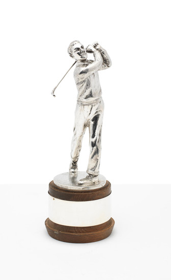 A silver golfing trophy