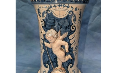 A studio pottery vase depicting a cherub - signed to base - ...