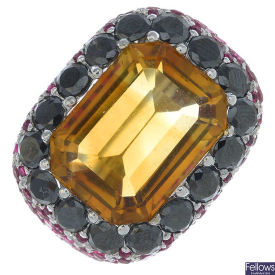 A vari-cut citrine, sapphire and synthetic red spinel cluster ring.