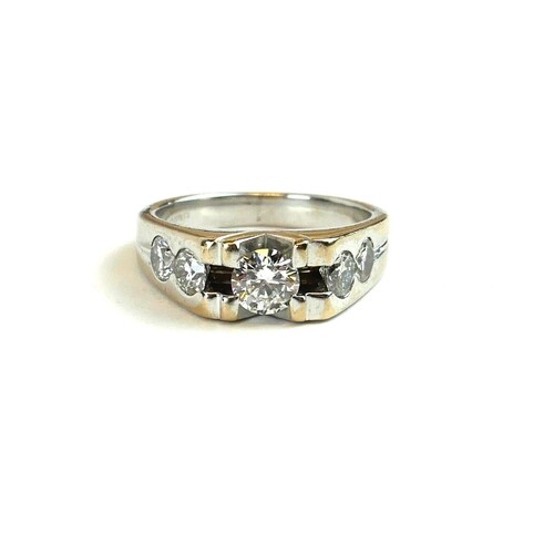 AN 18CT WHITE GOLD AND DIAMOND FIVE STONE RING The central r...