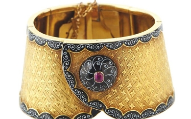 AN ANTIQUE GOLD AND ENAMEL CUFF BANGLE