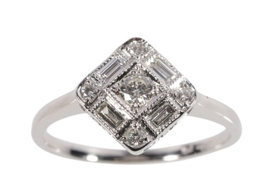 AN ART DECO DIAMOND RING c. 0.50ct total weight, on a platin...