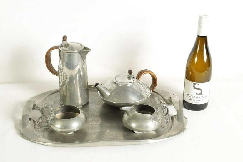 AN EARLY 20TH CENTURY ARCHIBALD KNOX FOR LIBERTY AND CO. TUDRIC PEWTER TEA SET