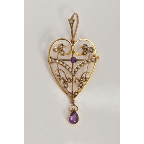 AN EDWARDIAN AMETHYST AND PEARL PENDANT/BROOCH, of an openwo...