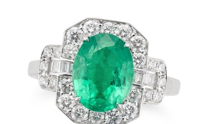 AN EMERALD AND DIAMOND DRESS RING set with an emerald of 2.75 carats in a border of round brilliant