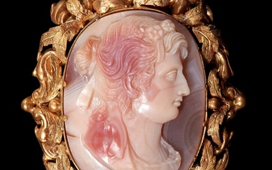 ANTIQUE CARVED HARD STONE CAMEO BROOCH, In high carat gold....