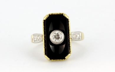 An 18ct yellow gold (stamped 750) ring set with onyx and a brilliant cut diamond, with diamond set shoulders, approx. 0.30ct centre stone, (