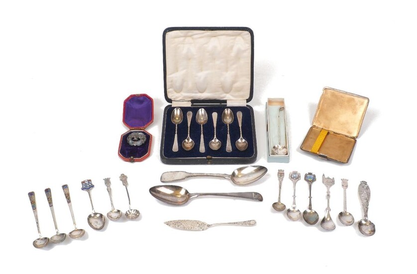 An Edwardian silver and agate thistle brooch, Birmingham, c.1910, Joseph Cook & Son, together with a small group of silver including a silver teaspoon designed with golf club handle, Birmingham, c.1928, Sanders & Mackenzie; a silver cigarette case...